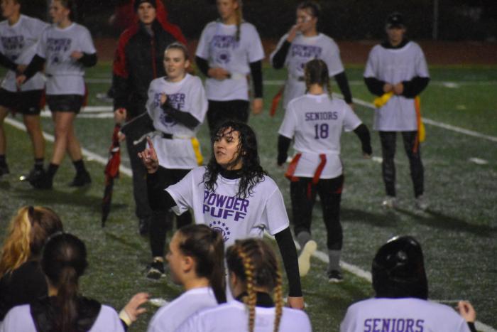 Senior Ruby Sugayan directs her team as the quarterback for the seniors 2017