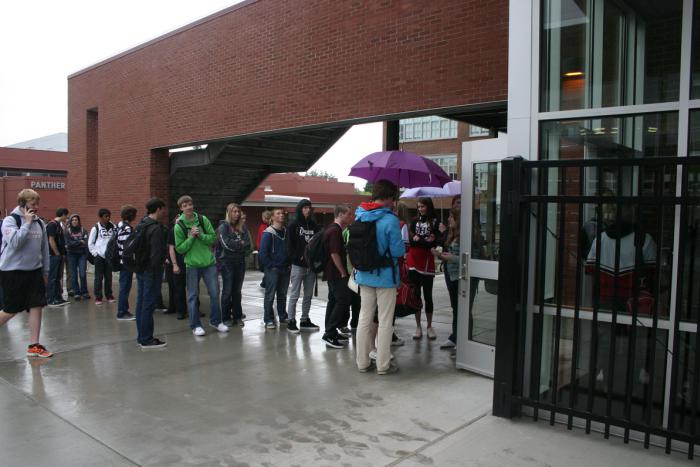 Students wait in line to pay fines before receiving their yearbooks