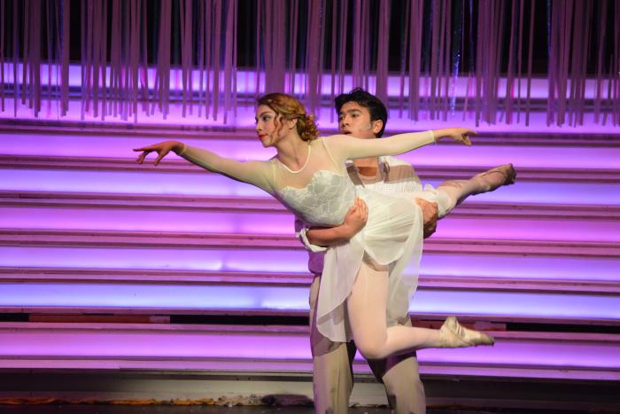 Junior Grace Fenner (featured dancer) and Braden Sigua (Don Lockwood) dance to "Broadway Melody" in SHS's Singin' in the Rain.